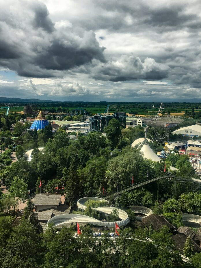 An aerial view of a park with a lot of trees